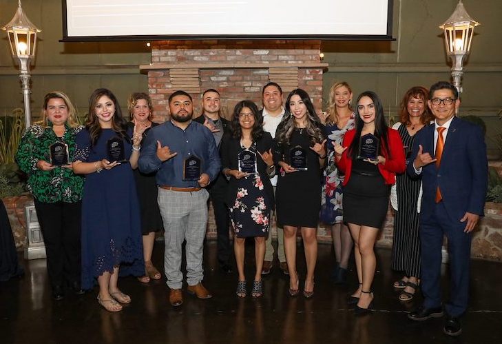 Clifton Tanabe, Ph.D., dean of UTEP's College of Education, right, led a March 24, 2022, celebration that honored some of the region's top novice and mentor teachers.  Photo by J.R. Hernandez / Marketing and Communications  