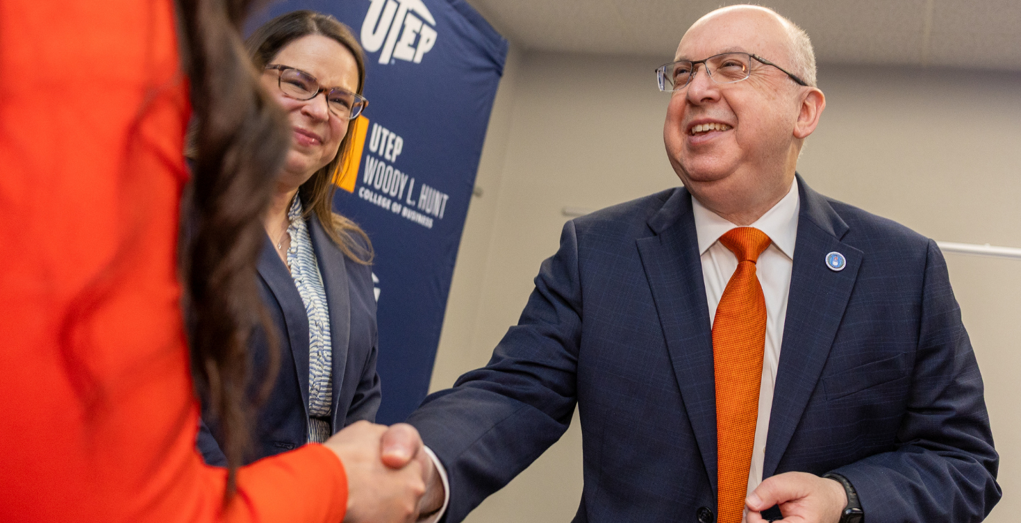 John Hadjimarcou, Ph.D., greeting students