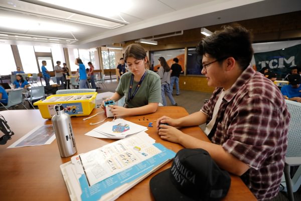 Mining Camp students working in pairs during a classroom activity.