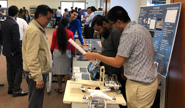 Electrical and Computer Engineering students showcasing their projects