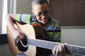 Kids Learn to Play Guitar at UTEP P3 Classes