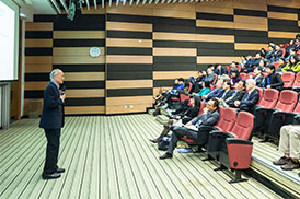 Person giving lecture in university classroom