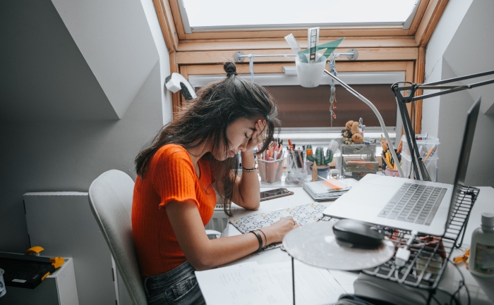 Distressed female student learning at home during the 2020 pandemic | UTEP Connect 