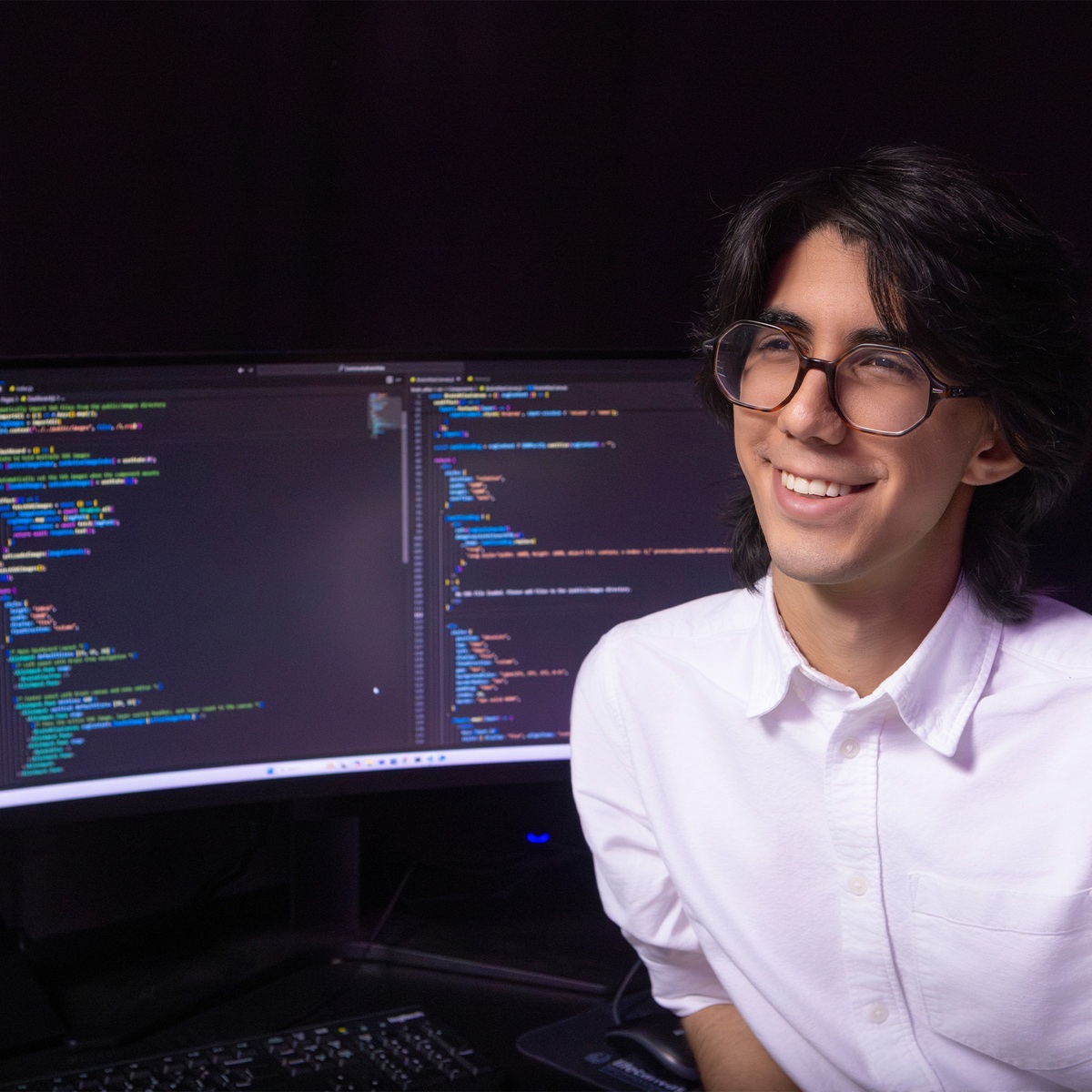 UTEP student working at a computer