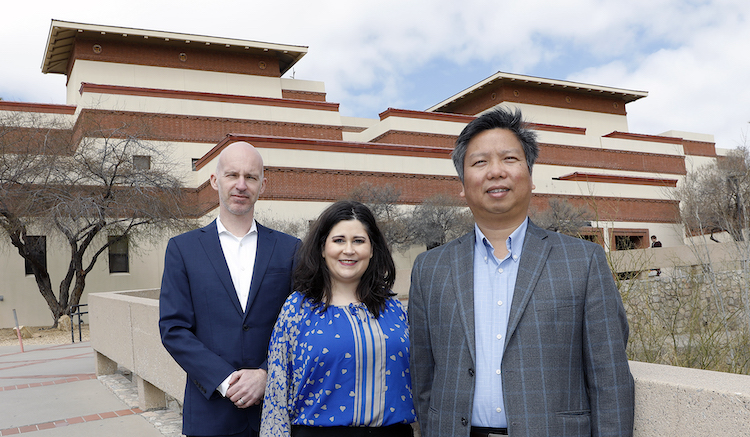 UTEP has been ranked one of the top institutions for real estate research productivity in the world, according to the Real Estate Academic Leadership (REAL) Rankings for 2017-2021. UTEP’s new ranking expands the University’s prominence in real estate education and research, and highlights the hiring of Zifeng Feng, Ph.D., (right) assistant professor of finance in COBA’s Department of Economics and Finance. He joins other UTEP real estate researchers such as Erik Devos, Ph.D., left, and Elizabeth Devos, Ph.D., center. Photo by Laura Trejo / Marketing and Communications 