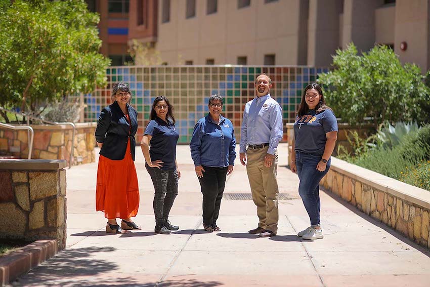 Ivonne Santiago, Ph.D., center, associate professor in The University of Texas at El Paso College of Engineering, has received a grant supporting her research team's ongoing work to provide thousands of households and dozens of schools throughout the state with access to reliable, clean water sources. Members of her team include, from left, Jeannie Concha, Ph.D., assistant professor of public health; Leslie Y. Nuñez, undergraduate research assistant and undergraduate student in civil engineering; Shane Walker, Ph.D., associate professor in civil engineering; and Ingrid M. Gust, undergraduate research assistant and undergraduate student in environmental science. Photo: J.R. Hernandez / UTEP Marketing and Communications 