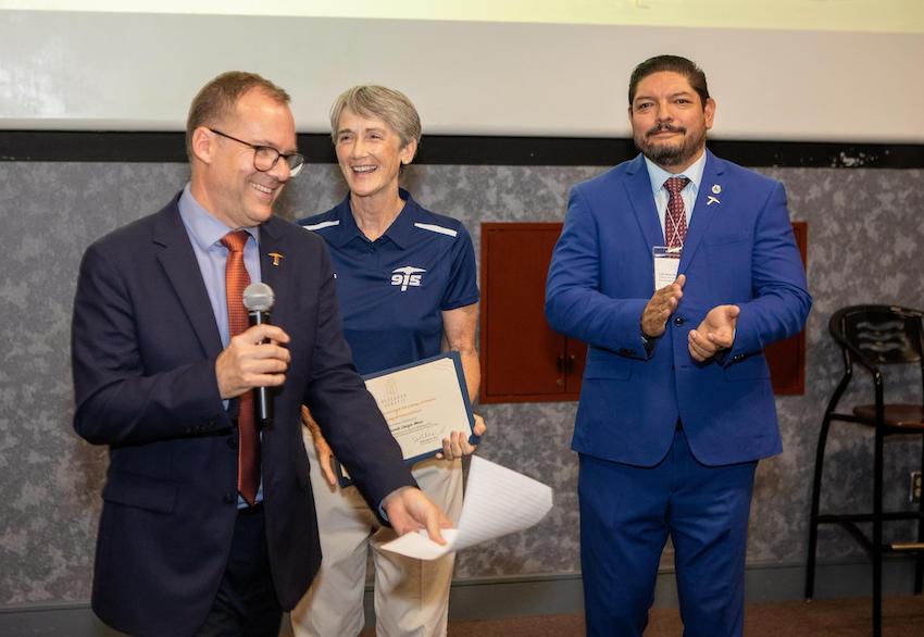 From left to right: UTEP College of Engineering Dean Kenith Meissner, Ph.D., UTEP President Heather Wilson and Universidad Autónoma de Chihuahua Director of Research and Graduate Studies Luis Carlos Hinojos Gallardo present awards at the Research Sandpit competition.  