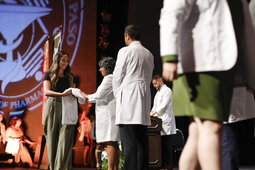 The UTEP School of Pharmacy hosted a White Coat ceremony on Saturday, Aug. 26, 2023, in honor of its Doctor of Pharmacy Class of 2027. This year's entering cohort is the largest in the history of the Pharm.D. program, consisting of 63 students who were also part of the largest applicant pool in the school’s history. 