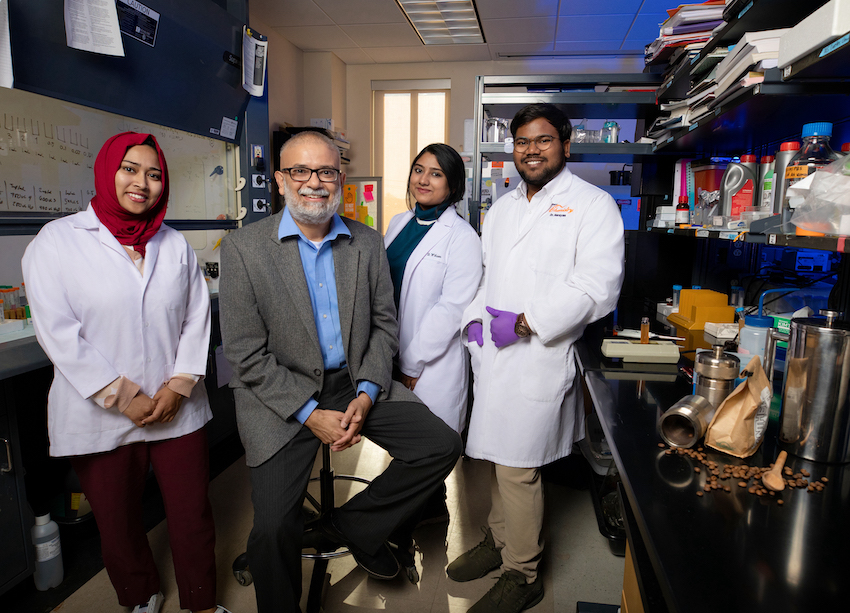 A team led by Jyotish Kumar (right), a doctoral student in the Department of Chemistry and Biochemistry at UTEP, and overseen by Mahesh Narayan, Ph.D. (second from left), a professor and Fellow of the Royal Society of Chemistry in the same department, found that caffeic-acid based Carbon Quantum Dots (CACQDs), which can be derived from spent coffee grounds, have the potential to protect brain cells from the damage caused by several neurodegenerative diseases. The team includes Afroz Karim (left), a doctoral student in the Department of Chemistry; and Ummy Habiba Sweety (second from right), a doctoral student in the Environmental Science and Engineering program. 