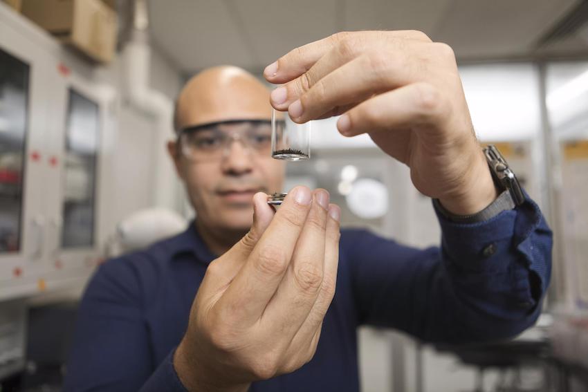 Physicist Ahmed El-Gendy, Ph.D., demonstrates the magnetism of a new material created for quantum computing. Credit: The University of Texas at El Paso 