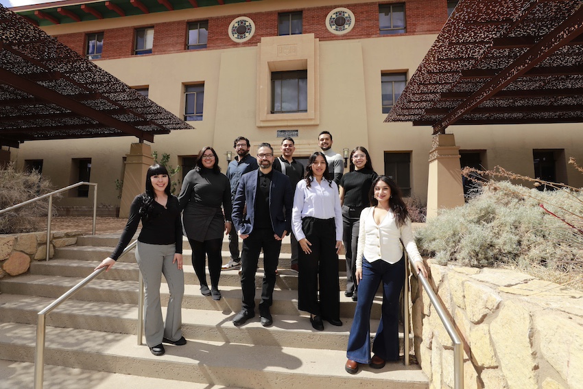 Sergio Iñiguez, Ph.D., professor in the Department of Psychology at UTEP, stands with his team of student researcher in front of the Psychology Building on the UTEP campus. Top row, from left: Daniel Calvo, Israel Garcia-Carachure, and Christopher Frausto. Middle row, from left: Anapaula Themann, Dr. Sergio Iñiguez, Joselynn Reyes, and Jessica Garcia. Bottom row, from left: Minerva Rodriguez, Paulina Vargas 