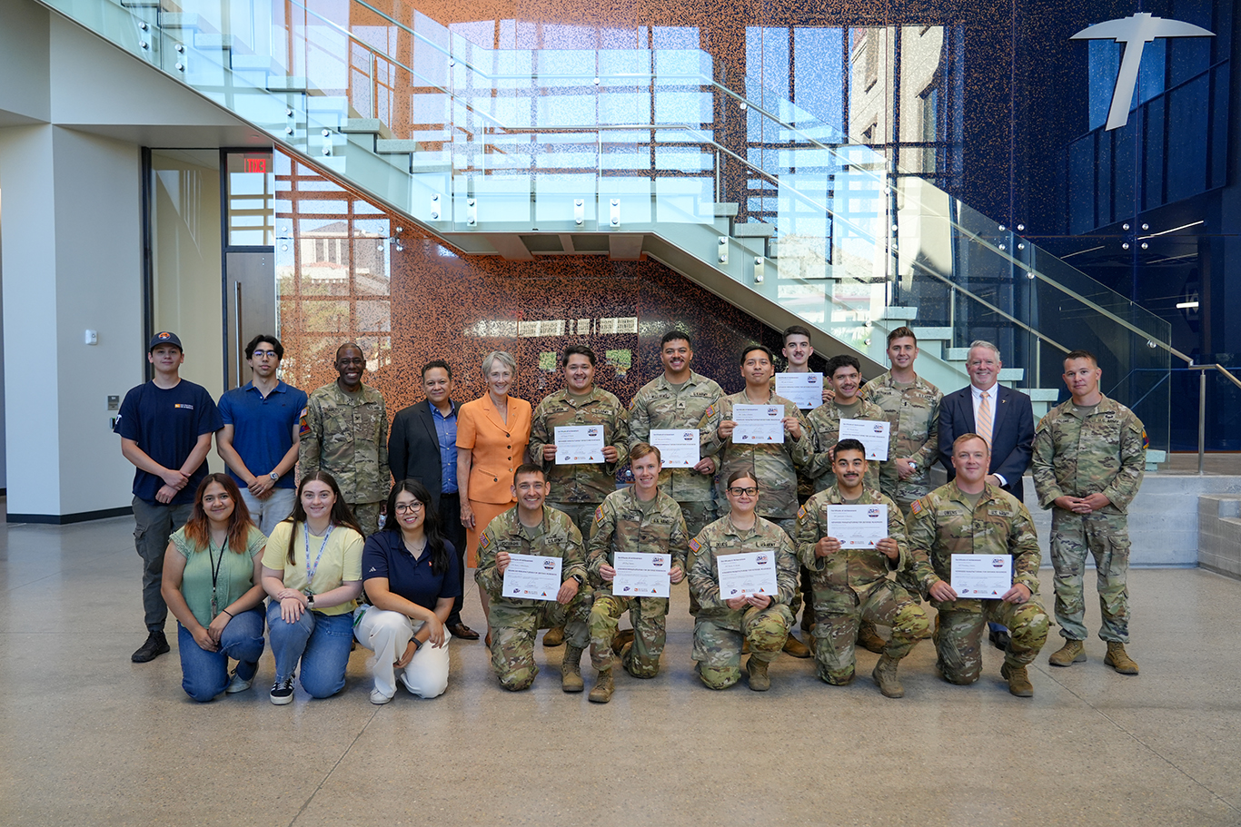 The first cohort of soldiers to complete the Advanced Manufacturing for Defense Readiness (AMDR) Certificate Program along with members of the W.M. Keck Center for 3D Innovation and UTEP President Heather Wilson. 
