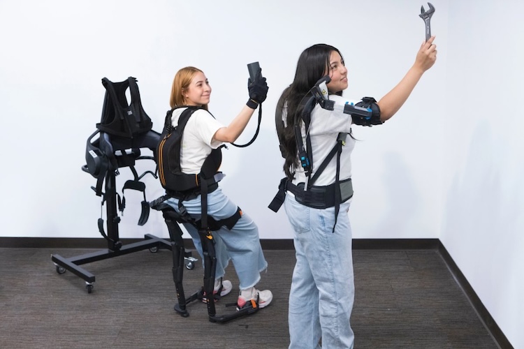 UTEP student Juliana Guevara Mendoza, left, wears a grip strength support device (Ironhand) and the sit-stand support exoskeleton (Chairless Chair), while Jessica Sanchez-Balandran works with a shoulder support exoskeleton (Skelex). The team recently conducted a study on barriers to workplace exoskeleton use.  
