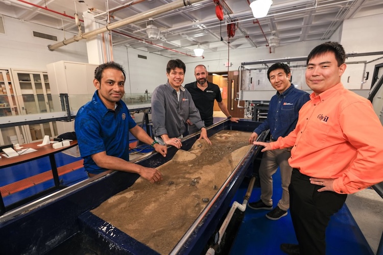 Engineering researchers stand next to a stream table in UTEP’s Hydrology Lab. The tool is used to physically simulate water flow, flash flooding, river processes and erosion. From left to right: Niamat Ullah Ibne Hossain, Ph.D., assistant professor in Industrial, Manufacturing, and Systems Engineering; Associate Professors of Civil, Environmental and Construction Engineering Sungmin Youn, Ph.D., and Jeffrey Weidner, Ph.D.; and Assistant Professors of Civil, Environmental and Construction Engineering Yong Je Kim, Ph.D., and Jaeyoon (Jason) Kim, Ph.D. 