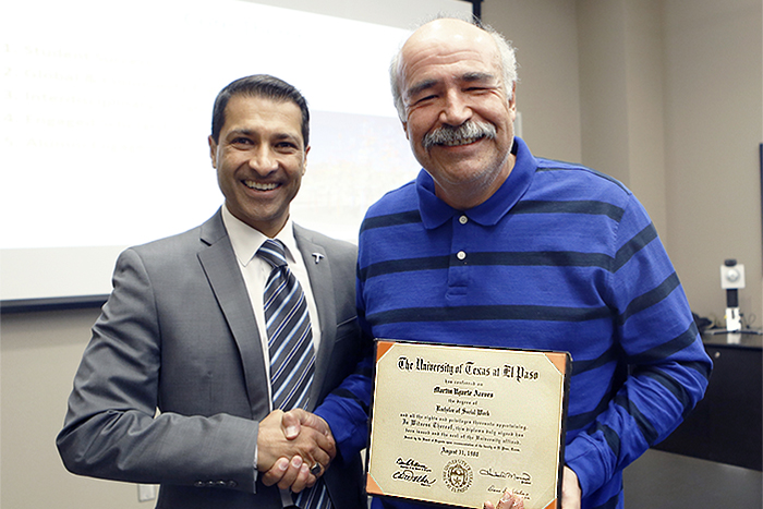College of Health Sciences Dean Shafik Dharamsi, left, met UTEP alumnus Martin Aceves  
