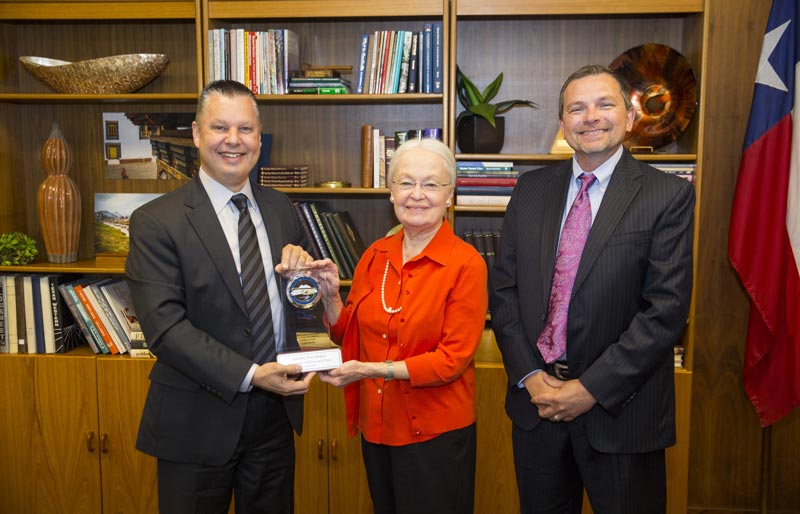 From left: Daniel Pleshko, vice president of quality and mission success for Lockheed Martin Aeronautics, Diana Natalicio, UTEP president, and Charles Akers, director of mission assurance for Lockheed Martin Aeronautics 
