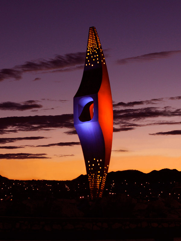 The 'Mining Minds' pickaxe sculpture will be illuminated in blue and orange from Wednesday evening, Dec. 12, through Sunday evening, Dec. 16, to commemorate UTEP’s Class of 2018. Photo: Laura Trejo / UTEP Communications 