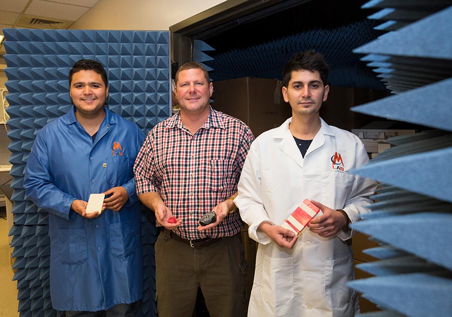 Raymond C. Rumpf's EM Lab includes, from left, Edgar Bustamante, research assistant; Rumpf, Ph.D., associate professor of electrical and computer engineering; and Cesar Valle, research assistant and lab manager. 