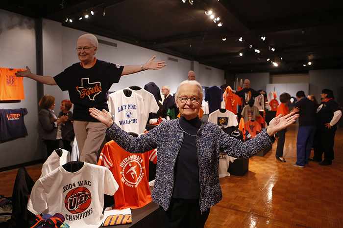 UTEP President Diana Natalicio stands in a new exhibit called “My Tenure in T-shirts,” which displays a T-shirt collection that documents the history of her years as president. The exhibit is open through March 15, 2019, inside the Union Gallery in room 201 Union Building East. Photo: JR Hernandez / UTEP Communications 