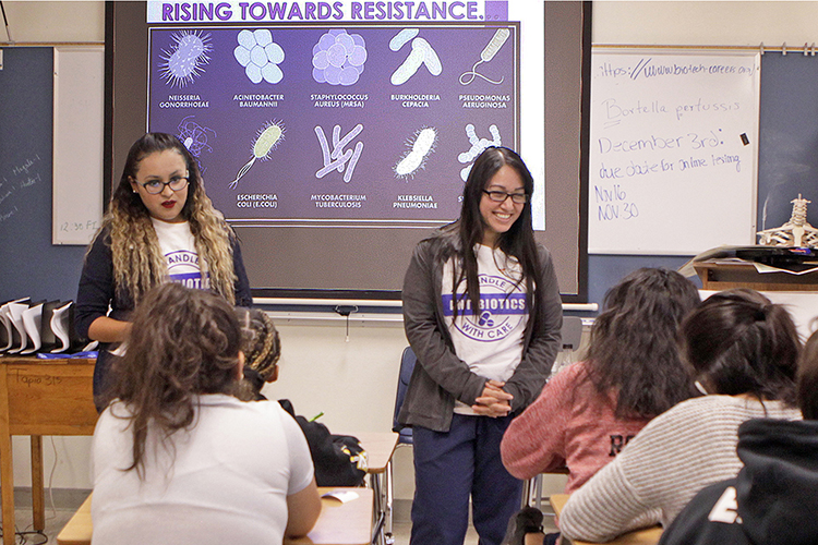 UTEP clinical laboratory science students Frances Paez, left, and Amanda Moore, right, participated in November’s U.S. Antibiotic Awareness Week at Silva Health Magnet High School. They talked to high school students about appropriate antibiotic use and the spread of superbugs. Photo: Laura Trejo / UTEP Communications 