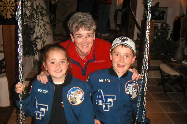 Dr. Heather Wilson poses with two of her own children.