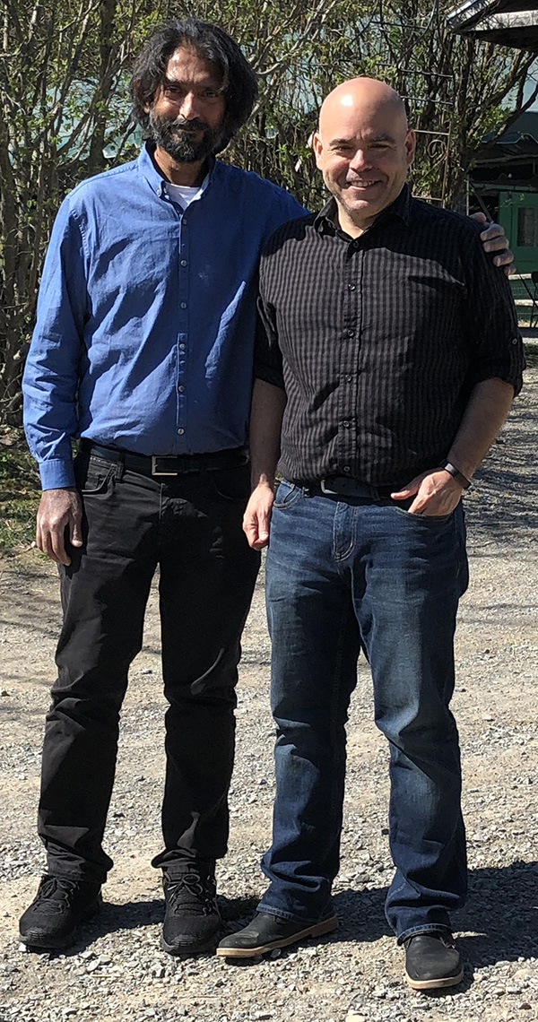 Arshad Khan, Ph.D., left, associate professor of biological sciences and director of The University of Texas at El Paso Systems Neuroscience Laboratory, stands with Andrew Poulos, Ph.D., assistant professor of psychology at the University of Albany in New York, in this April 2019 photo in Albany, New York. Photo: Courtesy 