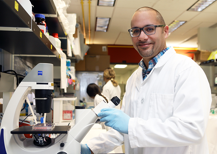 Luis R. Martinez, Ph.D., associate professor of biological sciences at UTEP, was awarded awarded a $2.7 million grant from the National Institutes of Health to study a potentially life-threatening fungus and suggest possible treatments. Photo by Laura Trejo / UTEP Communications 