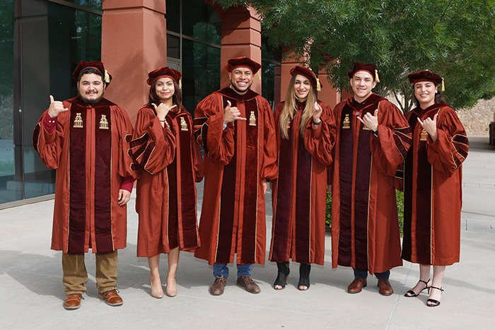 From left, Iraj Pourjavaheri, Rebecca Belmontes, Alejandro Acuña, Sarah Jallad, Erick Romero and Carmen Kerstiens were the last graduates from the UTEP-UT Austin Cooperative Pharmacy Program. They were honored during UTEP’s evening Commencement ceremony on May 18, 2019, marking the end of the 24-year program. Photo: Laura Trejo/UTEP Communications 