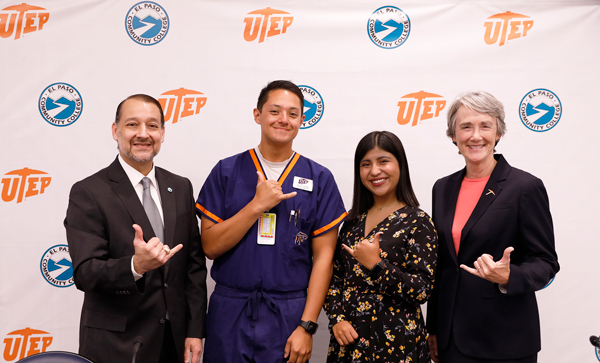 El Paso Community College President William Serrata, left, and UTEP President Heather Wilson, right, signed an agreement Monday, Nov. 15, 2021, to further eliminate barriers for students transferring between or simultaneously enrolled in UTEP and EPCC classes. They are joined by two UTEP students who transferred from EPCC: Elias Adair, a senior nursing student, and Laura Tovar, a junior industrial and systems engineering major. Photo: Laura Trejo / UTEP Marketing and Communications 
