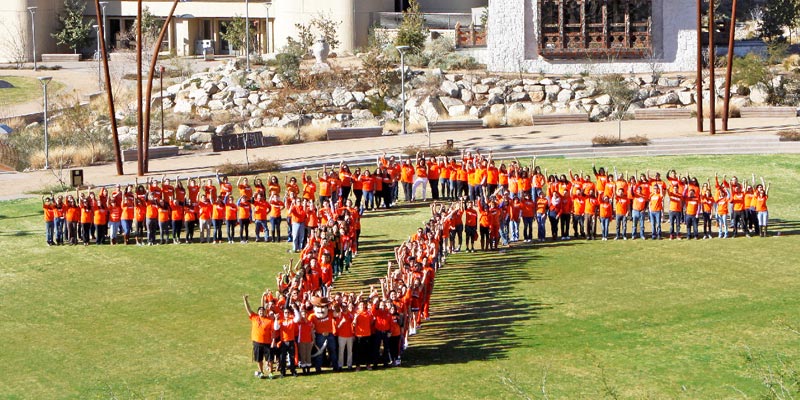 Students in Centennial Plaza Standing as a Pick